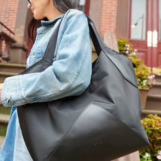 We designed the perfect tote for office days, travel days, and the every day. Spacious, slouchy, and effortlessly cool. ♻ 90% of this bag is made from recycled materials Travel Pouch Set, Slouchy Tote, Diaper Bag Tote, Toiletry Kit, Diaper Bag Backpack, Travel Pouch, Kids Backpacks, Shopping Tote, Lunch Bag