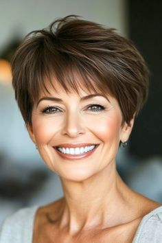 Save this pin for the best hairstyles for women over 60 with bangs. This textured pixie is perfect for women who want a low-maintenance style with plenty of personality. The choppy layers create volume, while the bangs add a soft touch. Razor Short Hair For Women, Haircuts For Over 60 Layered Bobs, Longer Pixie Haircut Older Women, Medium Pixie Haircut, Short Wavy Haircuts With Bangs, Hairstyles For Over 70 Year Old Women, Hair Styles For Women Over 70, Pixie Hairstyles For Fine Hair, Short Hair For Older Women