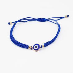 The Blue Evil Eye represents karma and protection. Throughout the whole human history, in every culture and religion, the eye figure has been considered as a powerful talisman to defy evil forces. One of the most popular amulets is the blue glass eye charm. The evil eye is a curse or legend believed to be cast by a malevolent glare usually catching a person unaware. You can wear an evil eye to save yourself from negative energies, such as anger, hatred, fear, jealousy and other such evil energie Affordable Adjustable Hand-strung Evil Eye Bracelet, Blue Evil Eye Bracelet, Evil Eyes, Blue Evil Eye, Eye Look, Bracelet Blue, The Evil Eye, Human History, Eye Bracelet