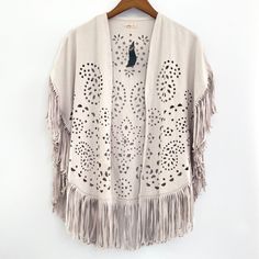 Hollister Grey Beige Boho Western Fringe Faux Suede Cardigan Poncho Sz Xs Beige, Cream, Tan, Greige New With Tags **There Are 2 Very Faint Marks That May Wash Out. One In Front One In Back. See Last 2 Pictures For Details Please Refer To All Pictures Closely For Condition And Approximate Measurements If Any, To Ensure Proper Fit. Measurements May Also Vary Based On Size, Fabric, Wash + Wear. Worn Garment May Also Include Signs Of Aging, Discoloring, Distressing, Markings/Flaws, Due To Wash, Wear, And Aging. Any Major Flaws Will Be Disclosed In Listing. Lighting May Also Affect True Color. All Orders Ship Quickly Within 1-2 Days Of Payment. Your Feedback Is Greatly Appreciated. If N Spring Fringe Cardigan For Layering, Fall Festival Open Front Tops, Beige Fringe Cardigan For Spring, Spring Beige Fringe Cardigan, Half Sweater, Hollister Cardigan, Hollister Crop Tops, Lace Poncho, Suede Cardigan