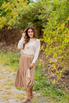 We cannot get over how stylish this skirt is! The cinched waist and accordion accents makes this such a cute, elegant look! Wear this skirt to any event and you are sure to receive compliments! We love tucking a blouse into this for a more elevated look or a basic or graphic tee for a casual feel!97% Polyester & 3% SpandexHand wash cold. Color separate. Do not bleach. Lay flat to dry. Low iron if needed. Boutique Shop, Cinched Waist, Gray Skirt, Ruffle Trim, Get Over It, Midi Skirt, Graphic Tees, Boutique, How To Wear