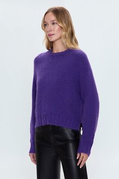 Medium weight sweater crafted from a knit blend that's soft to the touch. Raglan, long sleeves with monochromatic rib trim at neckline, sleeves, and hem. Designed with an elongated crop proportion and split hem that grazes the waistband. Royal Purple Sweater, Knit Cropped Sweater With Ribbed Cuffs For Layering, Winter Cropped Cashmere Sweater, Fall Cropped Textured Knit Sweater, Cashmere Cropped Sweater With Ribbed Cuffs, Cashmere Cropped Long Sleeve Sweater With Ribbed Cuffs, Cropped Textured Knit Sweater For Fall, Winter Cashmere Cropped Sweater For Layering, Soft Knit Long Sleeve Cropped Sweater For Layering