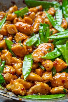 a pan filled with chicken and green beans