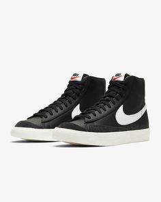 NEW MEN NIKE BLAZER MID '77 VINTAGE BASKETBALL SHOES MEDIUM COLOR: BLACK - WHITE - SILVER LEATHER - SYNTHETIC SIZES 8 - 8.5 - 9 - 9.5 - 10 - 10.5 - 11 - 12 - 13 SKU # DM1124 002 DESCRIPTION: VINTAGE STYLE. In the ‘70s, Nike was the new shoe on the block. So new in fact, we were still breaking into the basketball scene and testing prototypes on the feet of our local team. Of course, the design improved over the years, but the name stuck. The Nike Blazer Mid ’77 Vintage—classic since the beginning. Benefits Leather and synthetic upper keeps the classic look of the original while adding comfort and support. Vintage treatment on the midsole provides an old-school look. Autoclave construction fuses the outsole to the midsole for a streamlined look that echoes the ‘70s design. Exposed foam on th Estilo Cholo, Blazer Mid 77 Vintage, Basket Vintage, Nike Blazer Mid 77, Nike Blazer Mid, Black Leather Sneakers, Nike Blazers Mid, Black And White Shoes, Vintage Sneakers