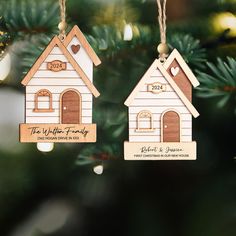 two wooden ornaments hanging from a christmas tree with the names and date on each ornament