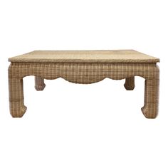 a wicker coffee table on white background