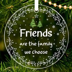 friends are the family we choose ornament hanging on a christmas tree