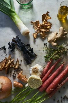 various vegetables and spices on a counter top