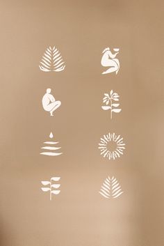 the silhouettes of different plants and animals are shown in white on a beige background