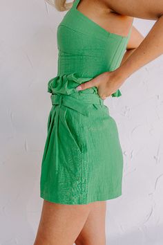 – There's no doubt people will be crushing on you when you arrive in these shorts – Lightweight cotton material with a soft rayon liner – Belt loops with detachable waist belt – Front pleated detail with two side pockets – Flattering silhouette that ends in straight mid-thigh length hemlines Summer Mini Bottoms With Pleated Waist, Chic Green Shorts With Short Inseam, Summer Mini Bottoms With Belt Loops, Green Summer Bottoms With Pleated Waist, Green Tie Waist Bottoms For Spring, Green Mini Shorts For Summer, Green Cotton Shorts For Day Out, Green Skort With Built-in Shorts, Green Mini Length Shorts For Summer