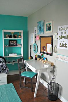 a bedroom with a desk, chair and bookshelf on the wall in front of it