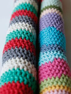 crocheted leg warmers with multicolored stripes