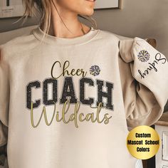 Elevate team spirit with our Custom Cheer Coach Sweatshirt - a cozy blend of comfort and personalization. Ideal for any occasion, this unisex heavy blend crewneck sweatshirt offers pure comfort with a touch of style. Crafted from a medium-heavy fabric blend of 50% cotton and 50% polyester (8.0 oz/yd this sweatshirt provides a warm and cozy feel, making it the perfect choice for those colder months. The classic fit, paired with the crew neckline, ensures a comfortable and clean-cut style - a vers Cheer Coach Svg, Coach Sweatshirt, Cheer Coach Shirts, Coach Svg, Cheer Coach Gifts, Cheerleading Coaching, Cheer Pom Poms, Coach Shirt, Cheer Practice