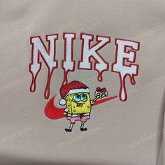 Introducing the Spongebob Santa Hat Nike Christmas Sweatshirt, a festive must-have for the holiday season! Made with premium-quality materials, this Family Christmas Gift Ideas, Matching Family Christmas Sweaters, Nike Christmas, Pokemon Sweatshirt, Disney Character Shirts, Jersey Bedding, The Spongebob, Hoodie Cartoon, Custom Nike