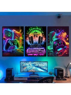 three gaming posters on the wall above a computer