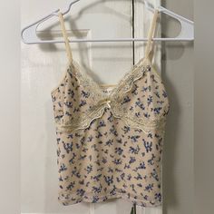 Brand: Pink Rose Size: Xs Color: Cream & Blue Condition: Brand New And Never Worn. In Perfect Condition!The Tank Top Has An Extra Layer Of Fabric On The Inside So It’s Not See Through At All! Lacy Tank Tops, Europe Fits, Lacy Tank Top, Vintage Cami, Thrift Inspo, Cream Tank Top, Blue Lace Top, Yellow Raincoat, Cute Tank Tops