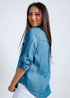 The Emilie Chambray Button Down Top! This casual button-down top features a chambray fabric, rich blue color and long sleeves you can roll up and button as well, classy for any occasion. Fabric: 100% Lyocell Care: Hand Wash Cold, Lay Flat To Dry Model: 5'3" Wearing a Small Chambray Fabric, Roll Up, Chambray, Lay Flat, Button Downs, Button Down Shirt, Hand Wash, Blue Color, Long Sleeves