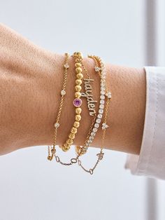 Elevate your everyday jewelry stack with the 18K Gold Birthstone Pisa Bracelet. Featuring your signature birthstone, this gold bracelet is the perfect blend of personal and chic. Dainty, delicate, and crafted out of 18k gold plated sterling silver, celebrate your birth month year round. Gold Birthstone Bracelet In 14k Gold Filled, 14k Gold-filled Birthstone Bracelets, 14k Gold Filled Birthstone Bracelets, 14k Gold-filled Yellow Gold Bracelets With Birthstone, 14k Yellow Gold Filled Birthstone Bracelets, 14k Gold Filled Yellow Gold Bracelets With Birthstone, Elegant Birthstone Tennis Bracelet As Gift, Gold Stackable Beaded Bracelets Fine Jewelry, Dainty 14k Gold Birthstone Bracelets