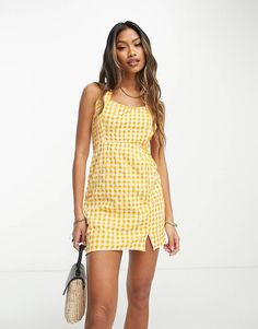 ASOS DESIGN halter knot detail mini sundress in orange gingham | ASOS Sleeveless Gingham Mini Dress For Summer, Trendy Mini Dress For Picnic, Plaid Mini Dress For Beach Summer, Summer Fitted Gingham Mini Dress, Summer Plaid Mini Dress For Beach, Trendy Gingham Dress For Summer, Gingham Mini Dress For Summer Vacation, Summer Plaid Mini Dress For Picnic, Summer Vacation Gingham Mini Dress