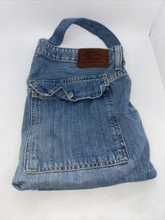 Tommy Hilfiger Women's Bag Blue Denim Pockets Shoulder Tote Red Label. Casual Distressed Denim Shoulder Bag, Blue Jeans With Pockets For Everyday, Denim Shoulder Bag With Pockets In Medium Wash, Medium Wash Shoulder Bag With Pockets For Travel, Casual Denim Shoulder Bag With Flat Pocket, Vintage Denim Bag With Pockets, Casual Tommy Hilfiger Bags For Everyday, Everyday Blue Tommy Hilfiger Shoulder Bag, Casual Denim Shoulder Bag With Cell Phone Pocket