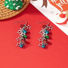 Cute Dangle Christmas Earring, Great To Show Your Spirit Or For A Gift. Silver Color Fish Hook 2 1/2 Inches Long. Multicolor Earrings For Christmas Gift, Christmas Party Dangle Earrings, Multicolor Christmas Earrings, Multicolor Holiday Dangle Earrings, Multicolor Dangle Earrings For Holiday, Blue Jewelry For Christmas Party, Blue Christmas Party Jewelry, Red Bead Earrings, Lion Earrings