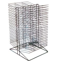 a large metal rack with multiple sections on it's sides and one section open