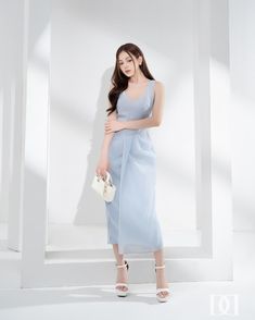 Product Details - Product type: Midi Dress- Material: Chiffon- Sleeveless- Scoop of neck - Pencil Skirt Size & Fit - Model wears size: S- Model measurement: 83 - 58 - 87, 175cm Care Instruction - Hand wash gently with cold water- Iron with low heat, drying clothes without wrinkles.