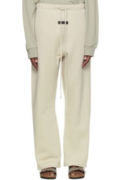 Fear of God ESSENTIALS - Beige Relaxed Lounge Pants Beige Athleisure Sweatpants For Spring, Beige Cotton Lounge Pants, Spring Beige Athleisure Sweatpants, Neutral Sweatpants For Fall Loungewear, Beige Cotton Pants For Lounging, Beige Cotton Lounging Pants, Beige Cotton Sweatpants In Athleisure Style, Beige Cotton Athleisure Sweatpants, Beige Sweatpants For Spring Loungewear