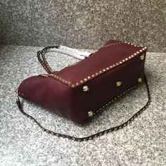 SHOP MORE LUXURY PRODUCTS HERE Description Valentino Medium Grainy Rockstud Bag Dark Red, For Women, Women’s Bags 19.3in/49cm Size:ÃƒÂ¯Ã‚Â¿Ã‚Â½ÃƒÂ¯Ã‚Â¿Ã‚Â½ÃƒÂ¯Ã‚Â¿Ã‚Â½ÃƒÂ¯Ã‚Â¿Ã‚Â½ 49 x 25 x 14 cm /19.3 x 10 x 5.5 inches (Width x Height x Length) Hook closureRemovable strapFlat zipper pocket Includes dust bag.This product is of the premium quality. Lady Bags, Dark Red, Women Rings, Contact Us, Calf Skin, Paper Bag, Clutch Bag, Bag Lady, Things To Come