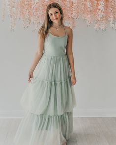 Some dresses are just made for beautiful destinations. The Wendy dress is just that with soft tulle and a beautiful tie back for a look that is dramatic yet down to earth. This is the women's version in mint, made to match with the girl's Wendy, Juliet and Fawn dresses in separate listings. Summer Bridesmaid Dress With Flowy Skirt, Green Flowy Breezy Midi Dress, Breezy Flowy Green Midi Dress, Green Breezy Flowy Midi Dress, Chic Sage Dress For Spring, Light Green Maxi Length Summer Dress, Green Summer Maxi Dress For Bridesmaids, Green Maxi Dress For Summer Bridesmaid, Breezy Green Dress For Garden Party