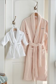 A simple way to turn any day into a spa day. Thick and plush, this robe envelops the wearer in luxurious warmth and comfort. The baby robe features the same quality (in miniature), so you can both feel extra pampered. White Long Sleeve Bathrobe, White Long Sleeve Bath Robe, Cozy White Robe For Relaxation, White Cozy Sleep Robe, Cozy White Sleep Robe, White Long Sleeve Relaxation Robe, White Long Sleeve Robe For Relaxation, White Long Sleeve Home Robe, Dad Gojo