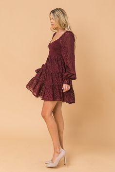 A jacquard woven mini dress featuring sweetheart neckline, puff sleeve with ruffled cuff, smocked bodice and tiered skirt Details Self: 100% Polyester Lining 100% Polyester Size & Fit - Model is 5`8" And Wearing Size Small - Measurements Taken From Size Small - Approx Length: 24.5" Smocked Bodice Fit And Flare Mini Dress, Party Mini-length Fitted Smocked Dress, Party Mini Length Fitted Smocked Dress, Ruffled Smocked Mini Dress For Party, Fitted Smocked Mini Dress For Party, Party Smocked Ruffle Dress Mini Length, Party Smocked Mini Dress With Ruffles, Mini Length Smocked Dress With Ruffles For Party, Smocked Ruffle Dress For Party, Mini Length