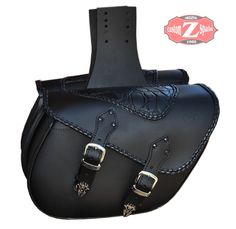 a black leather saddle with two buckles on the front and one in the back