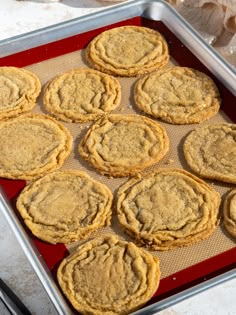 a pan filled with cookies sitting on top of a table