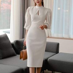 Item Type: Dress Material: Microfiber Gender: Women Neckline: Mandarin Collar Silhouette: Pencil Waistline: Natural Sleeve Style: Puff Sleeve Sleeve Length: Three Quarter Dresses Length: Mid-Calf Package Includes: 1 x Pc Size Info: Size Length (cm / inch) Bust (cm / inch) Waist (cm / inch) Hip (cm / inch) Sleeve (cm / inch) S 109 / 42.91 82 / 32.28 68 / 26.77 84 / 33.07 46 / 18.11 M 110 / 43.31 86 / 33.86 72 / 28.35 88 / 34.65 47 / 18.50 L 111 / 43.70 90 / 35.43 76 / 29.92 92 / 36.22 49 / 19.29 Fitted Pencil Dress, Makijaż Smokey Eye, Bodycon Dress With Sleeves, White Dresses For Women, Dresses Elegant, Vestido Casual, White Midi Dress, Lantern Sleeve, Pencil Dress