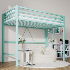 a blue bunk bed sitting on top of a wooden floor next to a white chair