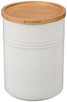 a white container with a wooden lid