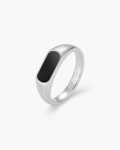 Diversify your ring collection with our men’s silver Stadium Signet Ring. This ring has a next-level shine and a sleek black epoxy accent that shows off the clean lines atop this men’s signet ring. Made with quality materials, this ring is meant to withstand everyday wear and tear while maintaining its shine for years to come. Modern Stainless Steel Signet Ring, Silver Stainless Steel Signet Ring With Polished Finish, Luxury Silver Men's Signet Ring, Black Sterling Silver Signet Ring For Collectors, Luxury Oxidized Finish Men's Signet Ring, Signet Ring Men, Silver Signet Ring, Solid Gold Chains, Silver Shop