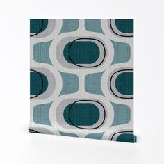 a blue and white wall hanging with circles on it