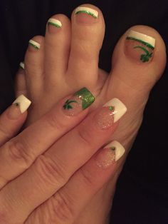 St Patrick's day nails and toes. White and green with glitter, shamrocks and rhinestones St Patricks Day Toe Nail Designs, St Patricks Day Nails French Tip, St Patrick Day Nails Acrylic Short, Patty Nails, St Patricks Nail Designs, Patrick Nails, St Patrick Day Nails Acrylic, Braided Ideas, Gold Toe Nails