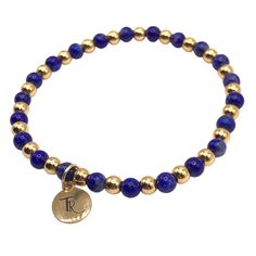 Blue Lapis Lazuli and Gold Beaded Stretch Bracelet Accented with 18K gold filled 4mm beads 4mm deep blue lapis beads Every bracelet I design is carefully thought out and crafted. Each individual bead is selected for its color, vibrancy, and size. I pay careful attention to how each bracelet lays on the wrist, how they nestle together as a stack, and how comfortable they are to wear together and individually. size: small 6.5" - 7"size: med 7" - 7.5" Blue Stretch Bracelet With Gold Round Beads, Blue Stretch Bracelet With Gold Beads, Lapis Lazuli Beaded Bracelets With Polished Round Beads, Gold Lapis Lazuli Beaded Bracelets With Round Beads, Gold Lapis Lazuli Bracelets For Gift, Elegant Blue Charm Bracelet With Round Beads, Hand-strung Gold Lapis Lazuli Bracelets, Gold Beaded Lapis Lazuli Bracelets, Gold Lapis Lazuli Spiritual Bracelets