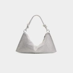 Cult Gaia "Hera" shoulder bag in allover shimmery rhinestones. Knotted shoulder strap, 10" drop. Zip top closure. Fabric lining. Item weight: 0.6 lbs. 5"H x 14"W x 4"D. Imported. Glamorous Top Handle Shoulder Bag For Night Out, Party Crossbody Baguette Bag, Party Baguette Bag With Detachable Strap, Party Baguette Crossbody Bag With Detachable Strap, Party Crossbody Baguette Bag With Detachable Strap, Chic Hobo Shoulder Bag For Party, Chic Party Clutch Baguette Bag, Chic Party Baguette Clutch Bag, Chic Clutch Baguette Bag For Party