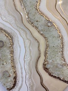 "An original, handmade, Ivory white and Champagne gold resin geode wall art, perfect as luxury wall decor and unique gifts. A beautiful epoxy resin art piece for modern style home that create a unique decor for any room. Stunning one of a kind geode painting in tones of Ivory, pearl white, champagne and gold undertone. The Epoxy resin painting measures 22X30\" and is handmade on gallery style wooden panel of depth 1-1.5 inches. Made with high quality pigments, glitters, glass crystals, real quar Resin Geode Wall Art, Geode Resin Art, Luxury Wall Decor, Resin Geodes, Geode Painting, Geode Wall Art, Geode Wall, Resin Geode, Painting Colors