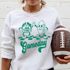 CREW NECK SIZING: Small- Length 27" , Width 20" Medium- Length 28" , Width 22" Large- Length 29", Width 24" XL- Length 30" , Width 26" 2XL- Length 31", Width 28" Retro Sweatshirt For Game Day, Sports Season, Retro Sweatshirt For Game Day And Sports Season, Retro Sweatshirt For Game Day, Retro Graphic Print Sweatshirt For Game Day, Game Day Fan Apparel Sweatshirt With Screen Print, Retro Game Day Sweatshirt With Letter Print, Retro Tops For College Football Season, Game Day Green Sweatshirt With Team Spirit, Green Team Spirit Tops For Game Day