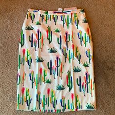 Beautiful & Colorful Cactus Print On White Pencil Skirt. Slight Stretch In Skirt But Waist Size Not Stretch. It Has A Short Split In Back W/ A Hidden Zipper. Ready To Ship Happy Shopping Multicolor Mini Pencil Skirt For Summer, Casual Multicolor Pencil Skirt For Spring, Front Zipper Skirt, Multicolor Floral Print Pencil Skirt, Midi Sweater Skirt, Brown Pencil Skirt, Green Midi Skirt, Plaid Pencil Skirt, Grey Pencil Skirt