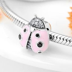 925 Sterling Silver pink Ladybug Flashing CZ Charms Spacer Stoper Beads Fit Original Pandora Charms Bracelet Bangles Jewelry Item specificsMain Stone: ZirconModel Number: PA0124Certificate Type: GTCItem Shape: IrregularItem Weight: 2.26gMetals Type: SILVEROccasion: Wedding, Engagement, AnniversaryGift for: Girlfriend ,Fiancee, Wife ,Lover, Mother ,DaughterMaterial 2: Promise 925 Sterling SilverSuitable for: original Bracelet Jewelry makingQuality: high qualityStyle: Cute,Trendy , Romantic------- Pink Charm Bracelet With Silver Beads, Ideal For Gifting, Pink Charm Bracelet With Silver Beads For Gift, Pink Charm Bracelet With Silver Beads As A Gift, Pink Sterling Silver Jewelry With Round Beads, Pink Jewelry With Silver Round Beads, Pink Silver Beads Bracelet, Pink Jewelry With Silver Beads As A Gift, Pink Sterling Silver Bracelets With Charms, Pink Sterling Silver Bracelet With Lobster Clasp