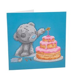 a greeting card featuring an elephant with a birthday cake