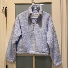 Nwt Hollister Quarter Zip Fleece Top Super Soft Pockets On Side Blue Comfortable Fleece Tops, Blue Fleece Top For Spring, Blue Fleece Tops For Spring, Cozy Blue Fleece Tops, Cozy Blue Fleece Top, Light Blue Sweatshirt For Winter Loungewear, Blue Crew Neck Outerwear For Loungewear, Cozy Light Blue Winter Tops, Blue Cozy Top