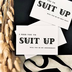 two cards that say, i need you to suit up and will you be my groomsman?