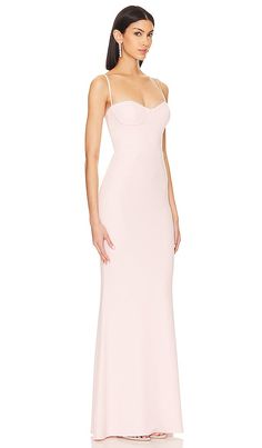 Find KATIE MAY Yasmin Gown on Editorialist. Katie May Yasmin Gown in Blush. - size L (also in M, S, XL, XS, XXS) Katie May Yasmin Gown in Blush. - size L (also in M, S, XL, XS, XXS) It's rare to find a dress that balances the line of charm and flirtation, but the Katie May Yasmin Gown in Blush has pulled it off. With a boned bodice and underwire bust, this gown exudes charm and allure. Crafted in crepe fabric with delicate neckline loops, it's the epitome of gentle femininity. Step into the allure of pastel perfection, perfect for any formal occasion. Don't just follow trends, set them.. Self: 97% polyester 3% spandex Lining: 100% polyester. Made in USA. Dry clean only. Partially lined. Hidden back zipper closure Adjustable shoulder straps. Boned bodice with underwire bust Crepe fabric wit Sweetheart Evening Dress, Floral Evening Dresses, Katie May, Designer Dresses For Women, Boned Bodice, Pink Gowns, Tulle Gown, Grad Dresses, Satin Gown